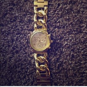 Michael kors gold watch.